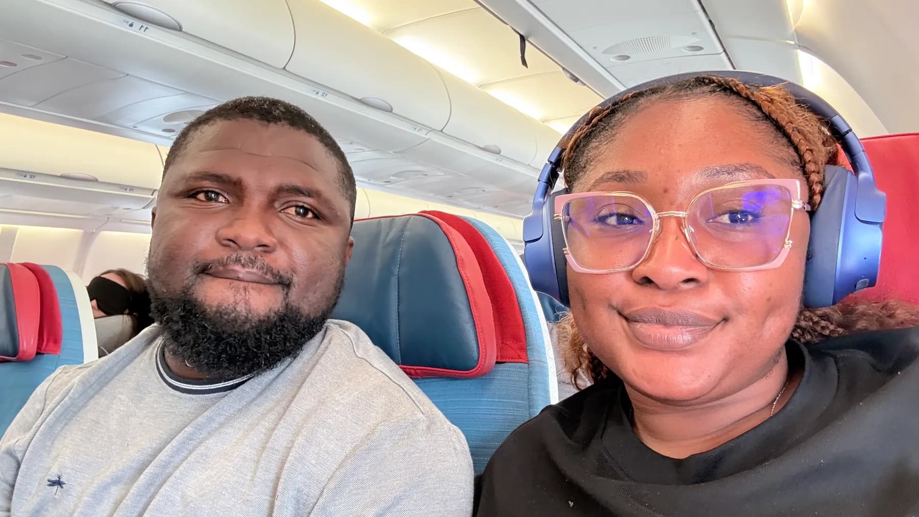 Emmanuel and Ruth on the flight home